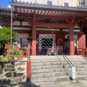 Red Temple Gate and Steps Leading to an Inner Hall. Osaka, Japan.
