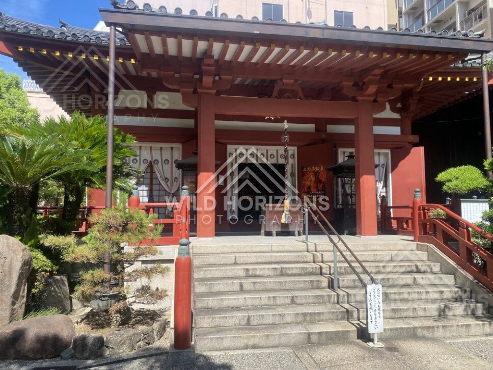 Red Temple Gate and Steps Leading to an Inner Hall. Osaka, Japan.