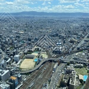 Aerial View Over Osaka with Highways, Rail Lines, and Dense City Blocks. Umeda Sky Building, Osaka, Japan.