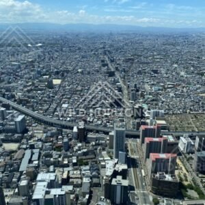 High-Angle View Down a Major Osaka Boulevard with Elevated Roads and Rails. Umeda Sky Building, Osaka, Japan.