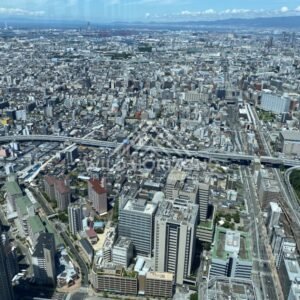 Aerial View Toward Osaka Bay with Port Infrastructure and Elevated Transport Lines. Umeda Sky Building, Osaka, Japan.