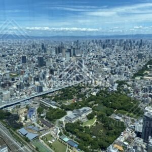 Aerial View Over Osaka Parkland and Skyline with Elevated Roadways. Umeda Sky Building, Osaka, Japan.