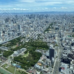 Broad View Over Osaka with Park Greenery and a Wide City Horizon. Umeda Sky Building, Osaka, Japan.