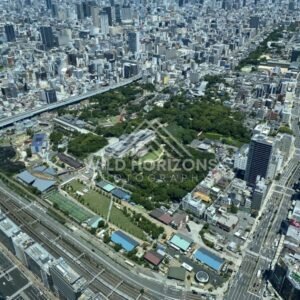 Aerial View of Central Osaka with Parkland and Rail Lines. Umeda Sky Building, Osaka, Japan.