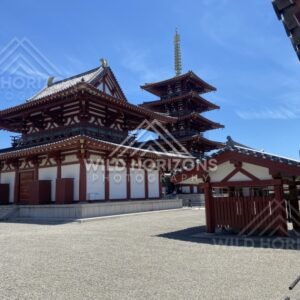 Temple Hall and Pagoda Overlooking a Sunlit Gravel Courtyard. Shitennoji Temple, Osaka, Japan.