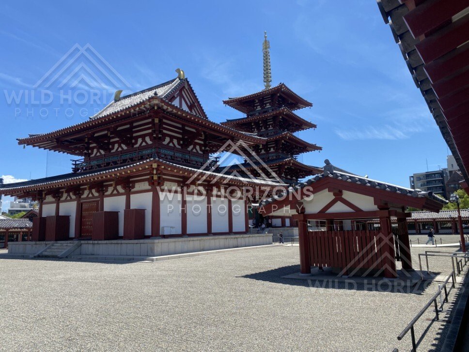 Temple Hall and Pagoda Overlooking a Sunlit Gravel Courtyard. Shitennoji Temple, Osaka, Japan.