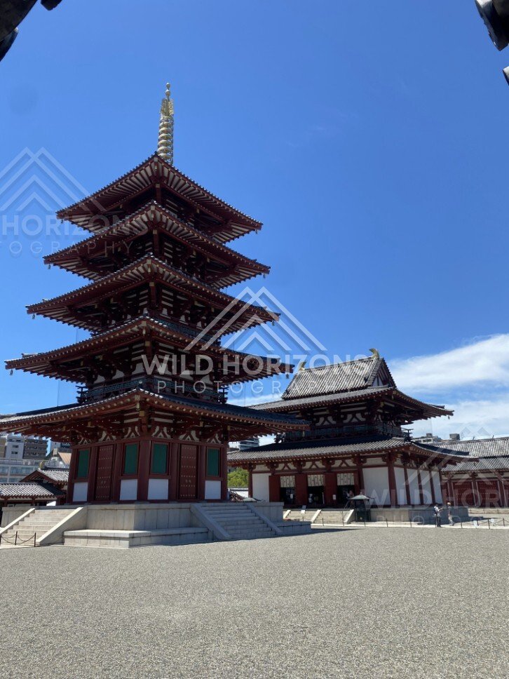 Pagoda and Temple Hall Standing Over a Broad Gravel Forecourt. Shitennoji Temple, Osaka, Japan.