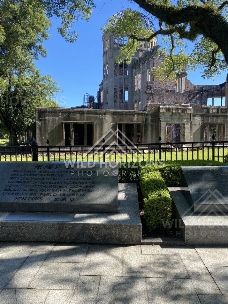 Interpretive plaques positioned in front of the Atomic Bomb Dome. Hiroshima Peace Memorial, Hiroshima, Japan.