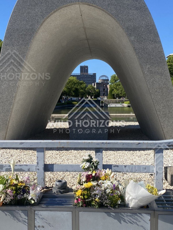 Close view through the memorial arch toward the Peace Memorial. Hiroshima Peace Memorial Park, Hiroshima, Japan.