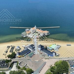 Aerial view of pier complex and beachfront with surrounding facilities. Fukuoka, Japan.
