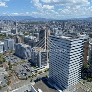 High viewpoint over modern city buildings and streets. Fukuoka, Japan.