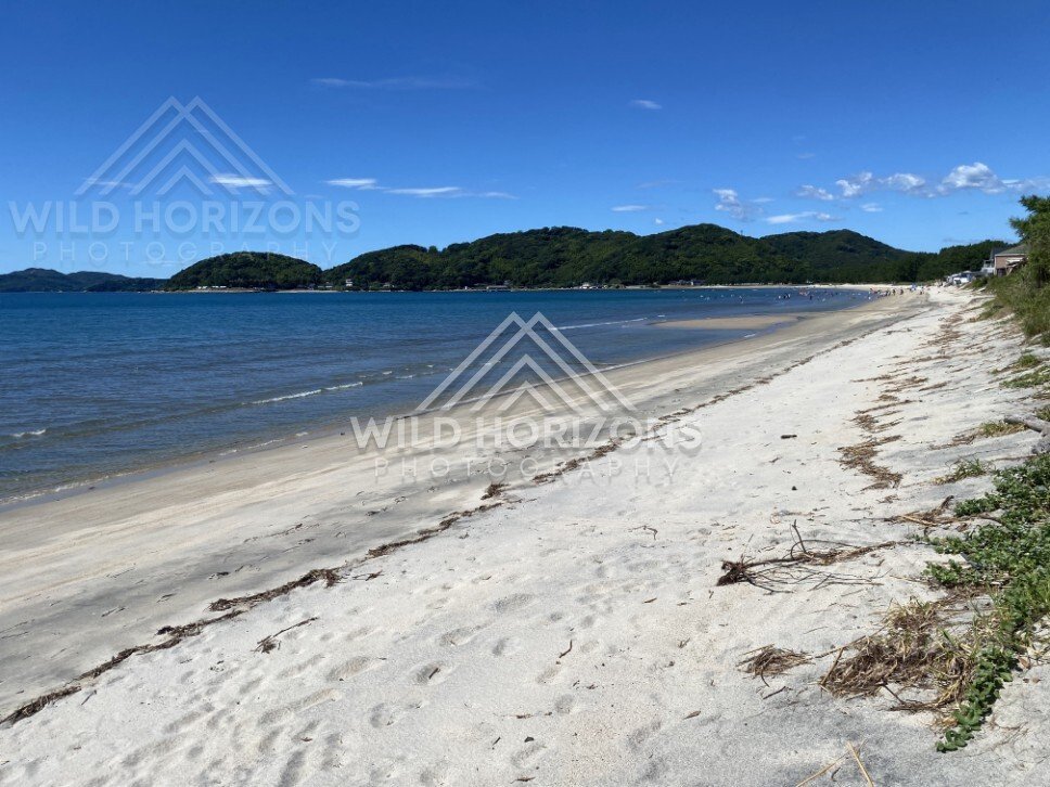 White Sand Shoreline at Nijinomatsubara Beach. Karatsu, Japan.