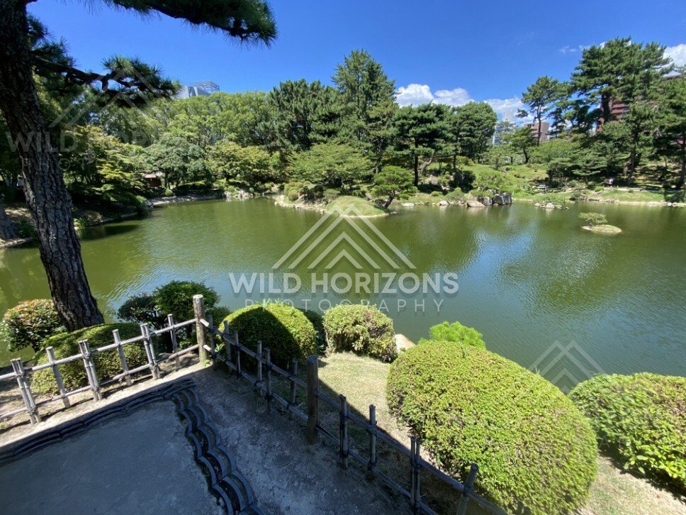 Panoramic Pond and Manicured Shrubs in Shukkeien Garden. Hiroshima, Japan.