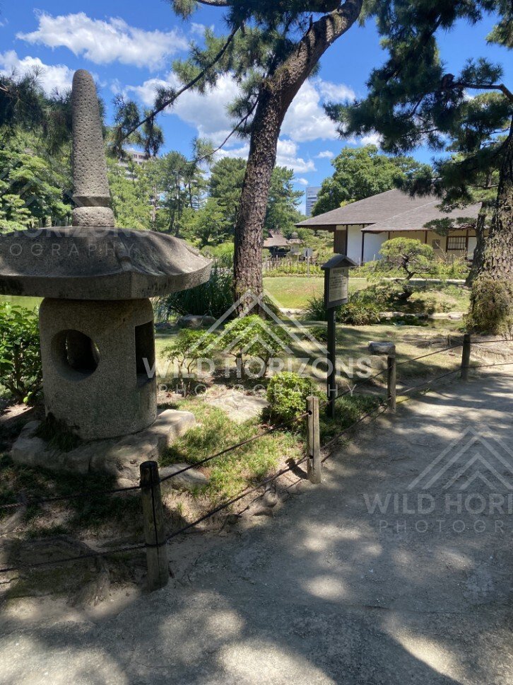 Stone Lantern and Tea House Garden Scene. Hiroshima, Japan.