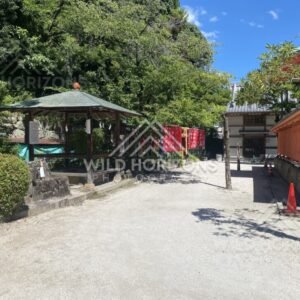 Shrine Courtyard with Red Banners at Kinko Inari Shrine. Hiroshima, Japan.