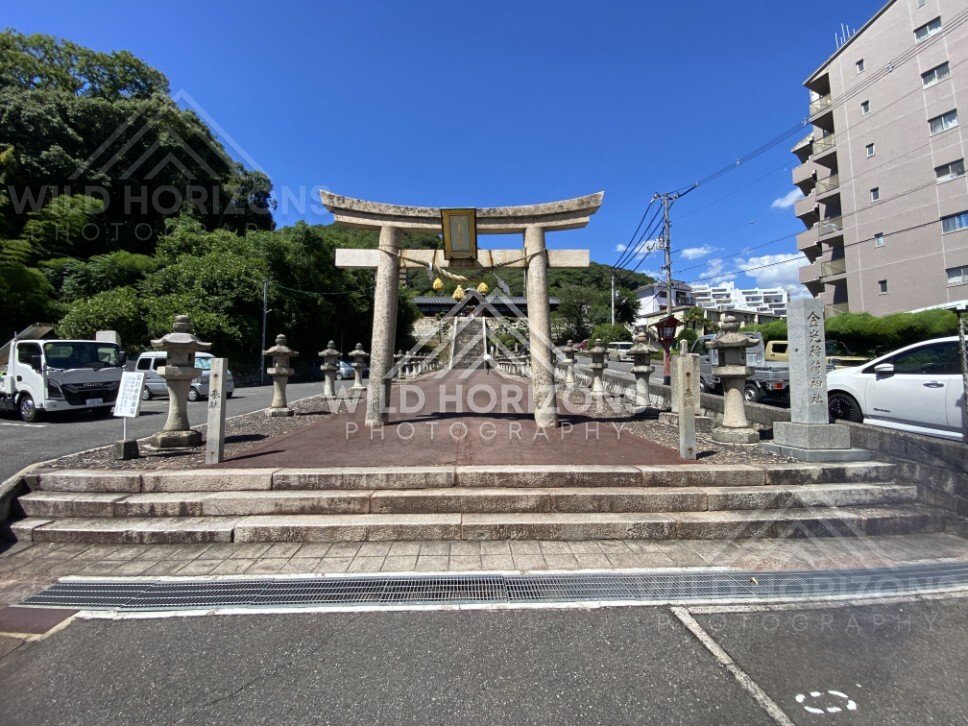 Stone Torii Gate and Approach to Kinko Inari Shrine. Hiroshima, Japan.