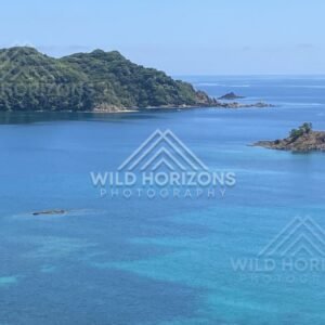 Rocky Islets and Shallow Reefs in Clear Blue Water. Shimane, Japan.