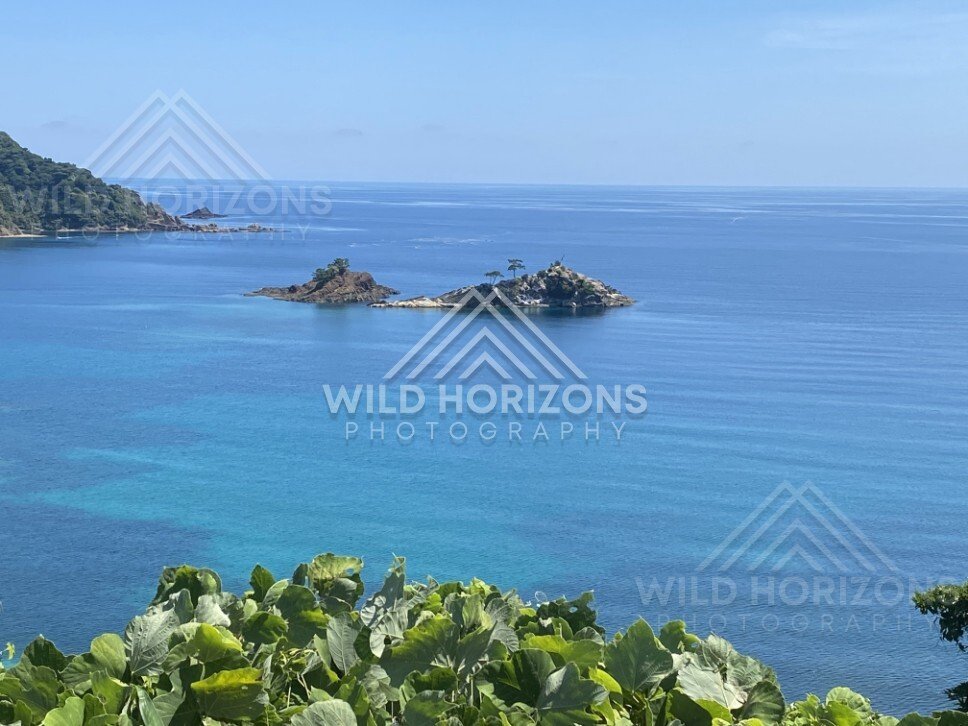 Offshore Islets Surrounded by Turquoise Shallows and Blue Water. Shimane, Japan.