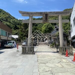 Large Stone Torii Gate at a Shrine Approach. Mihonoseki, Japan.