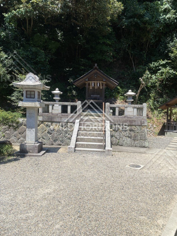 Small Forest Shrine Reached by Stone Steps and Lanterns. Mihonoseki, Japan.