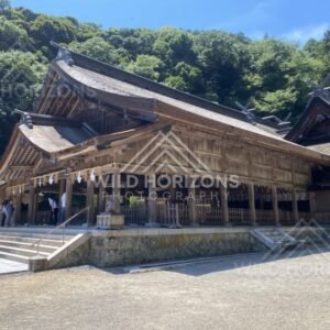 Main Shrine Hall With Thatched Roof and Visitors on the Steps. Mihonoseki, Japan.