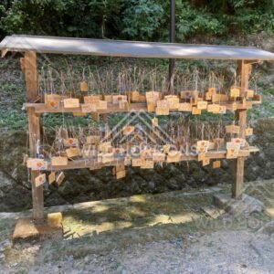 Prayer Plaques Hanging on a Wooden Ema Rack. Mihonoseki, Japan.
