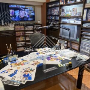 Recreated manga artist studio desk exhibit at the Gosho Aoyama Manga Factory. Hokuei, Japan.