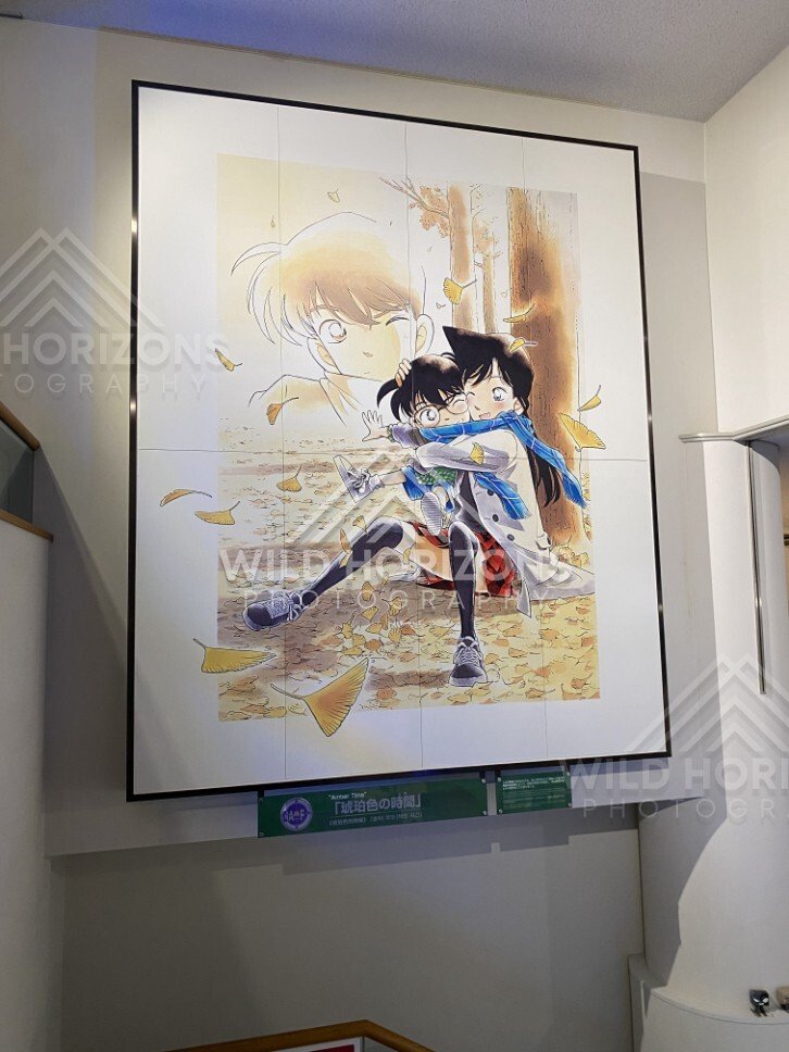 Large framed Detective Conan artwork display inside the Gosho Aoyama Manga Factory. Hokuei, Japan.
