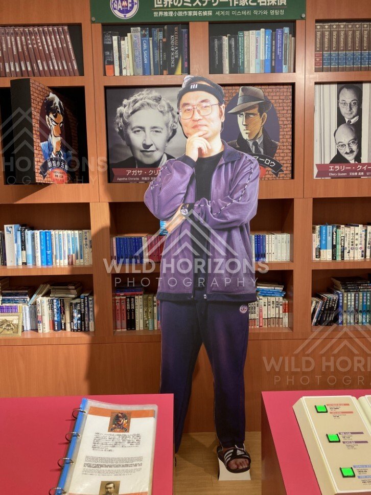 Gosho Aoyama cardboard cutout in a mystery literature display at the museum. Hokuei, Japan.