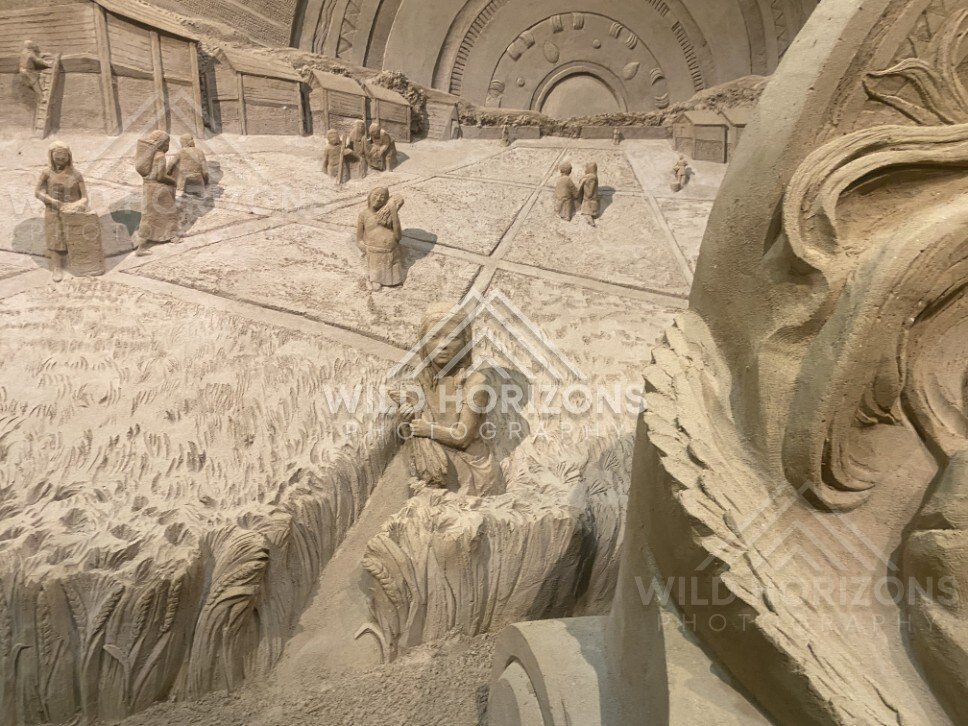 Sand Sculpture Detail of Figures in a Rice Field at Tottori Sand Museum. Tottori, Japan.