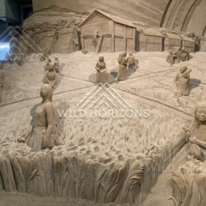Wide Sand Sculpture Scene of Village and Rice Fields at Tottori Sand Museum. Tottori, Japan.
