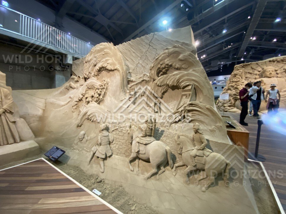 Large Sand Sculpture Relief with Mythic Sea Creature and Figures. Tottori Sand Museum, Japan.