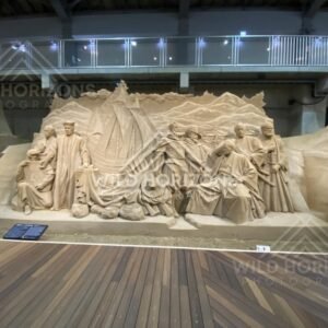 Sand Sculpture Tableau with Mountain Backdrop and Figures. Tottori Sand Museum, Japan.