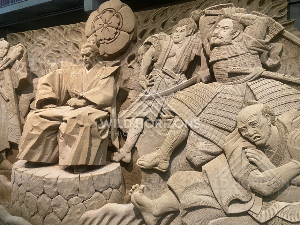 Sand Sculpture Relief of Noble Figure and Battle Scene. Tottori Sand Museum, Japan.