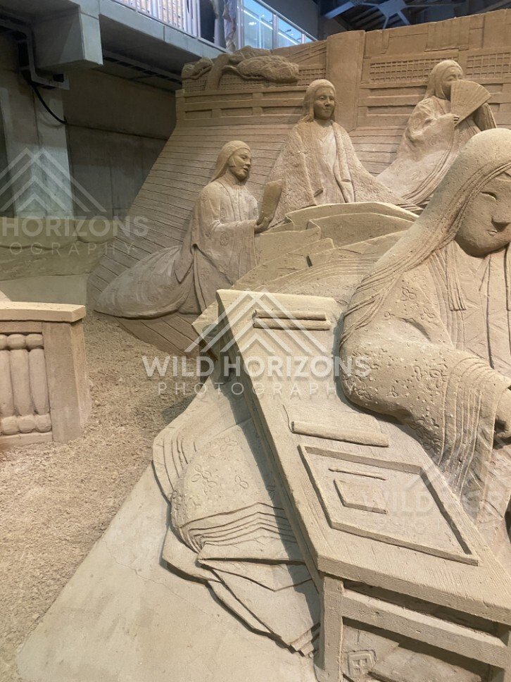 Close-Up Sand Sculpture of Traditional Figures and Draped Fabrics. Tottori Sand Museum, Japan