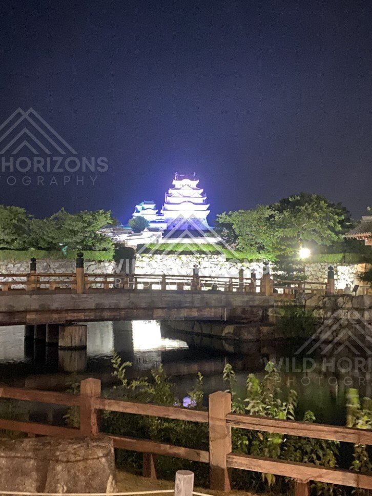 Night View of Himeji Castle Reflected in the Castle Moat. Himeji Castle, Japan.