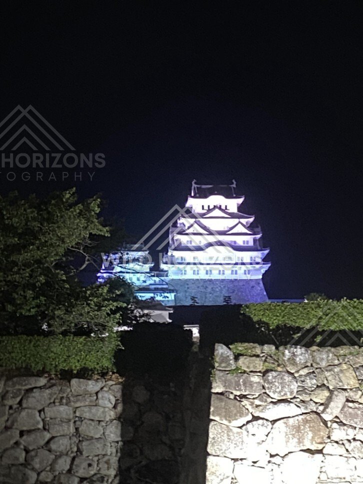 Close-Up of the Illuminated Keep of Himeji Castle at Night. Himeji Castle, Japan.