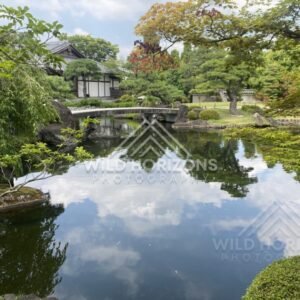 Arched Stone Bridge Reflected in the Pond at Koko-en Garden. Himeji, Japan.