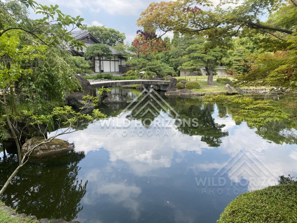 Arched Stone Bridge Reflected in the Pond at Koko-en Garden. Himeji, Japan.