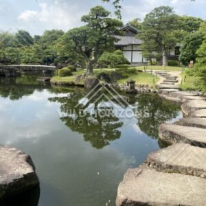 Stepping Stones Along a Pond Edge at Koko-en Garden. Himeji, Japan.