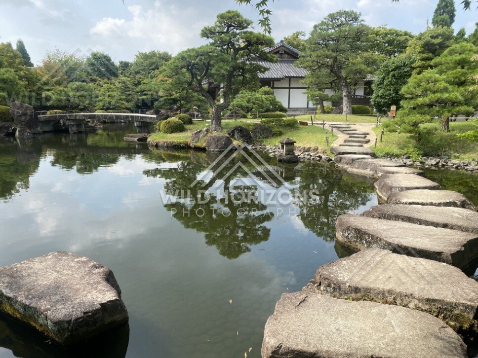 Stepping Stones Along a Pond Edge at Koko-en Garden. Himeji, Japan.