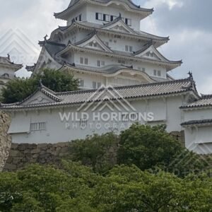 Upper Keep of Himeji Castle Above White Walls. Himeji, Japan.