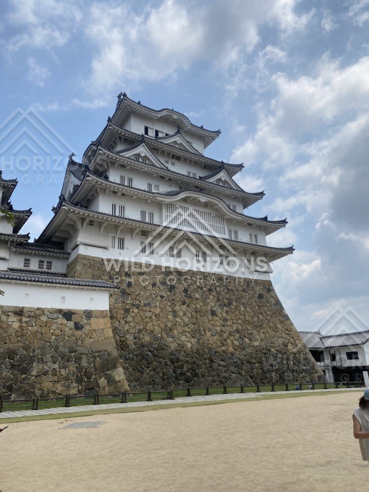 Towering Stone Base and White Keep of Himeji Castle. Himeji, Japan.