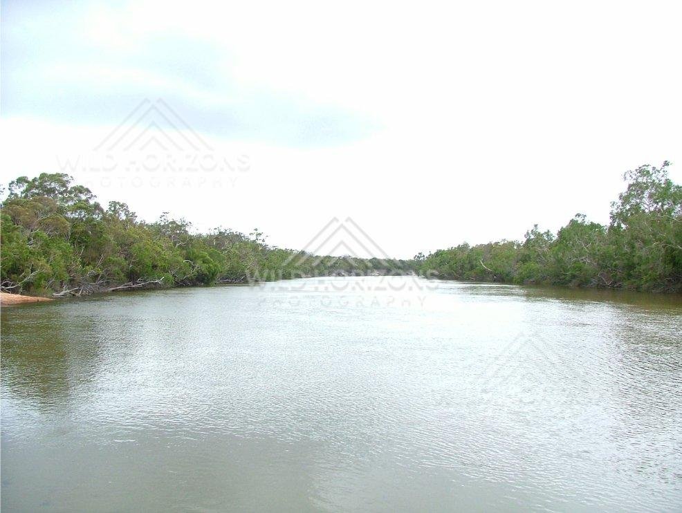 Broad waters of the Jardine River seen from the ferry landing. Jardine River, Australia.