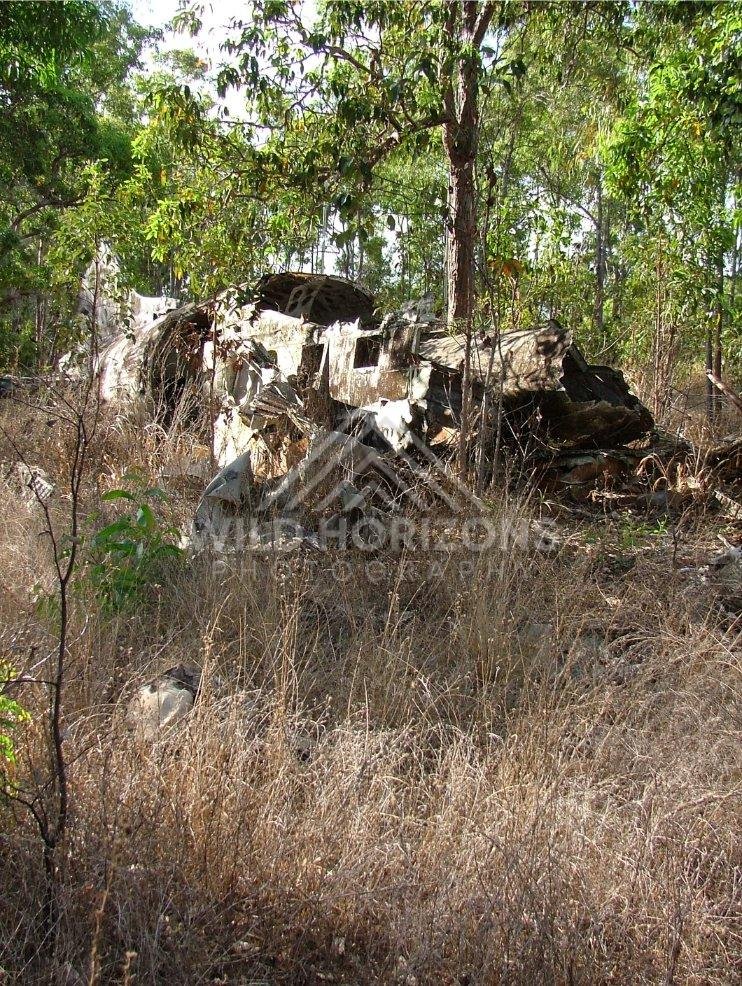 Abandoned aircraft remains in tropical woodland. Seisia, Australia.