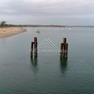 Anchored boats across a sheltered bay at Seisia. Seisia, Australia.