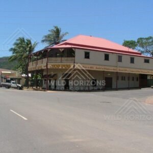 In Cooktown, a traditional two-storey tropical building stands along the historic main street. Cooktown, Australia.