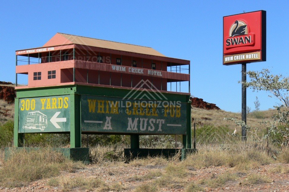 Replica Whim Creek Hotel roadside sign with Swan Brewery emblem. Pilbara, Australia.