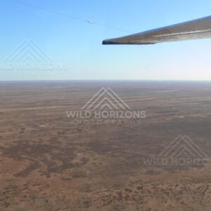 Endless gibber plains approaching Kati Thanda–Lake Eyre. Lake Eyre Basin, Australia.