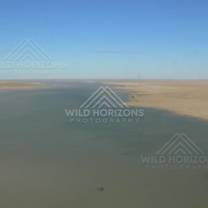 Expansive inland floodwaters viewed from the air. Lake Eyre Basin, Australia.